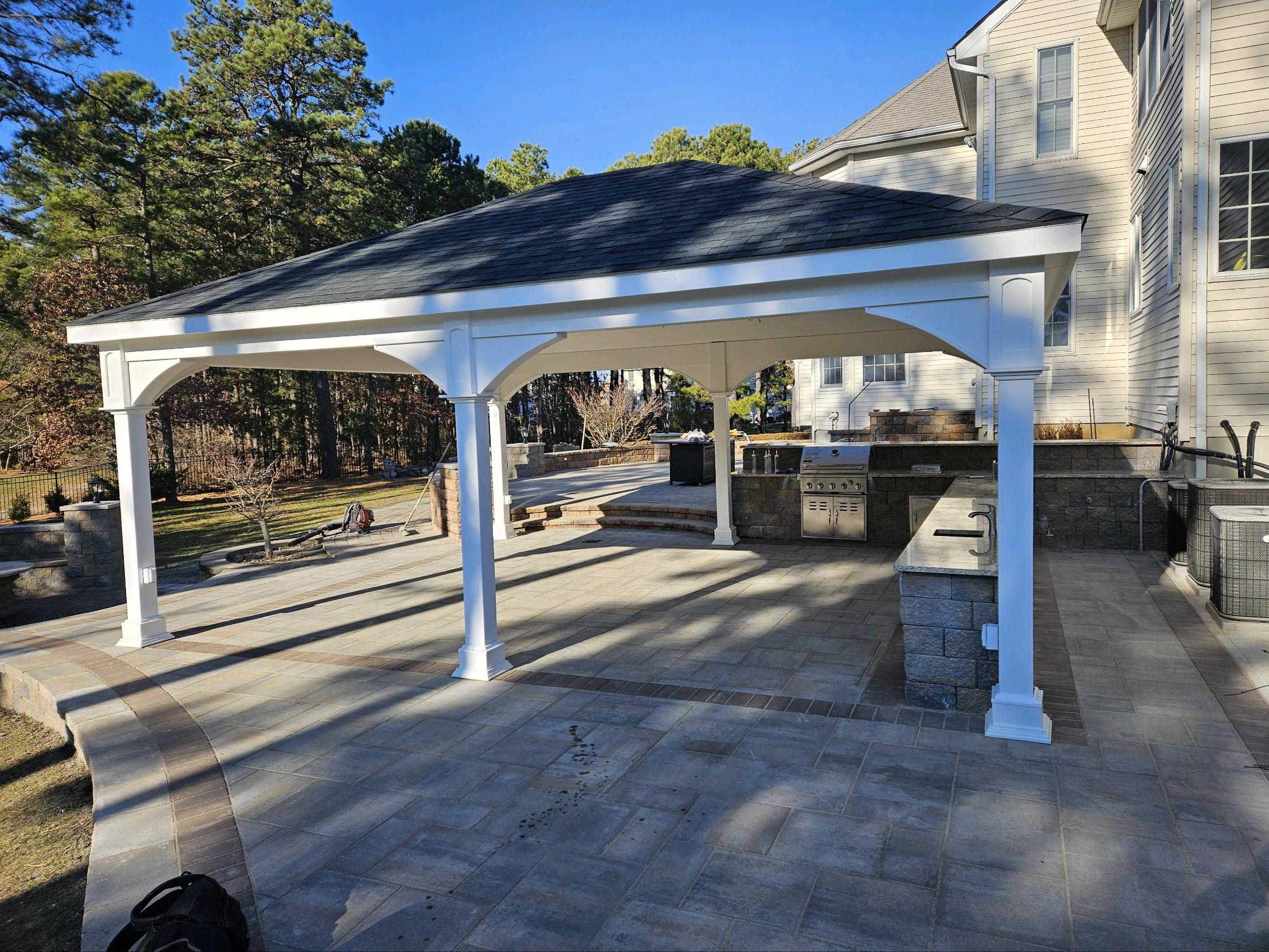 A freshly doen outdoor kitchen from exterior angle